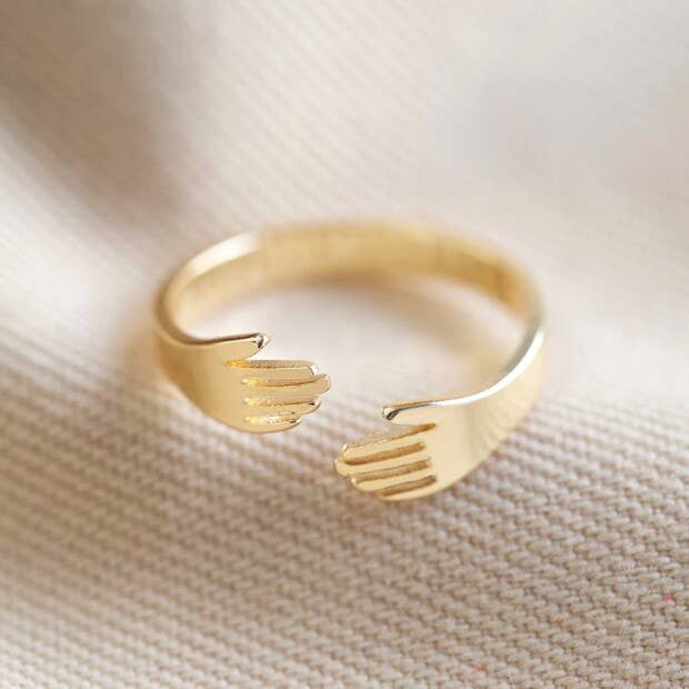 adjustable gold hug hands ring
